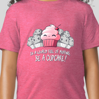 In a World of Muffins, Be a cupcake! Girls Youth Graphic Tee